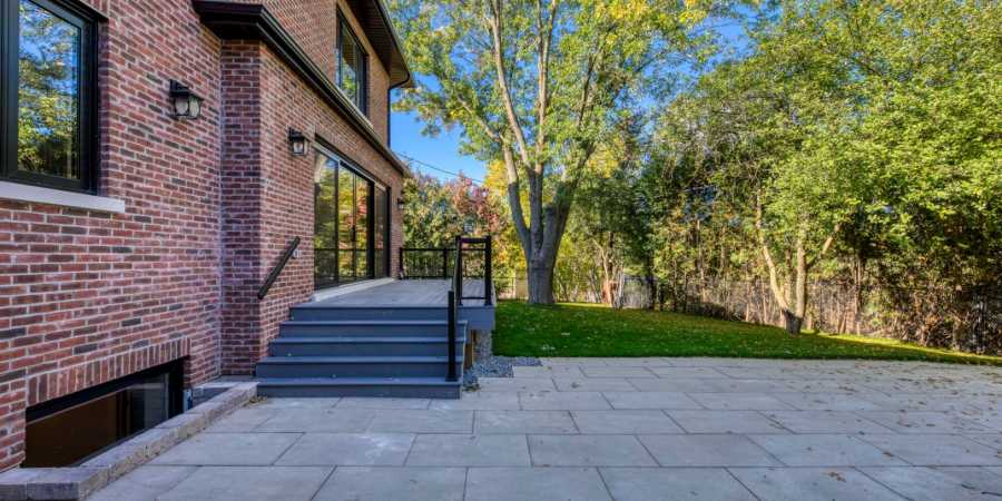 amazing backyard with interlocking and custom deck - home renovations mississauga